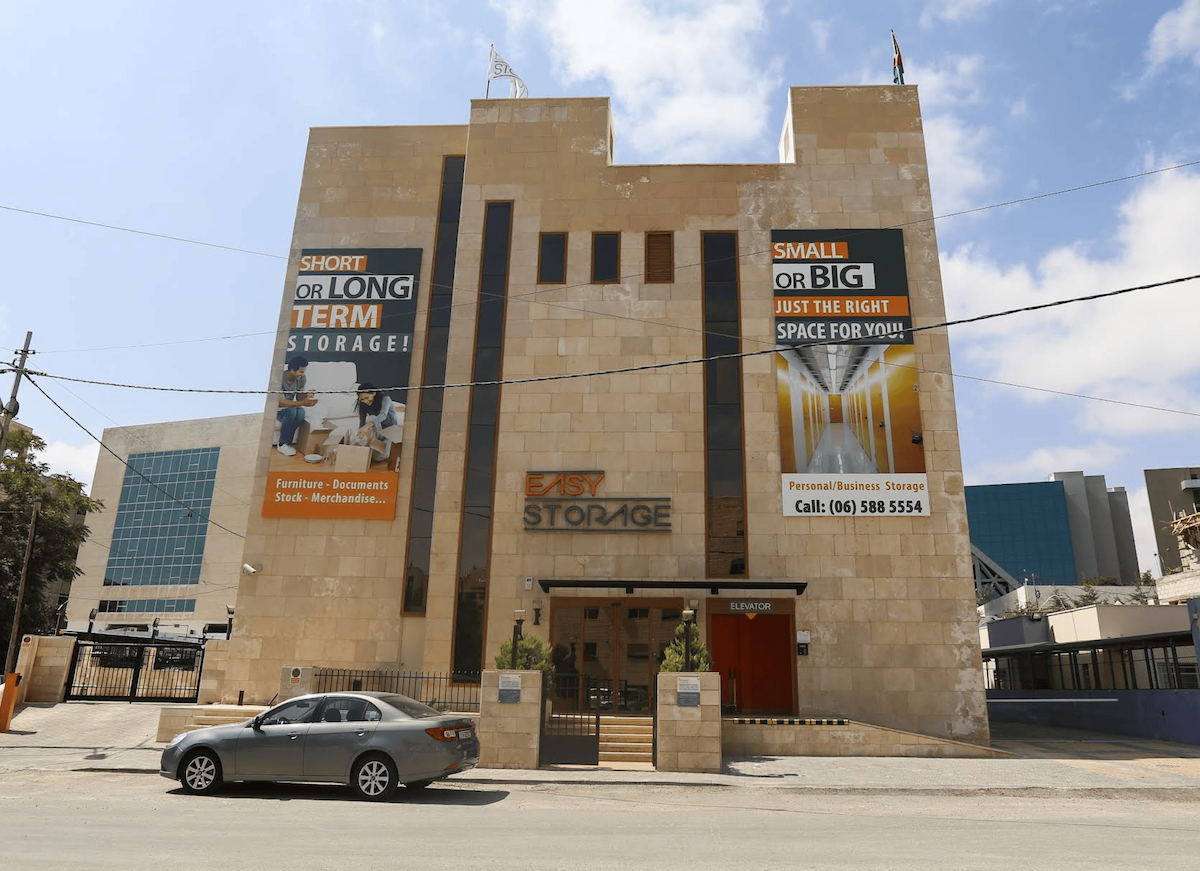 EasyStorage 8th Circle Amman — stone-clad facility exterior with storage signage