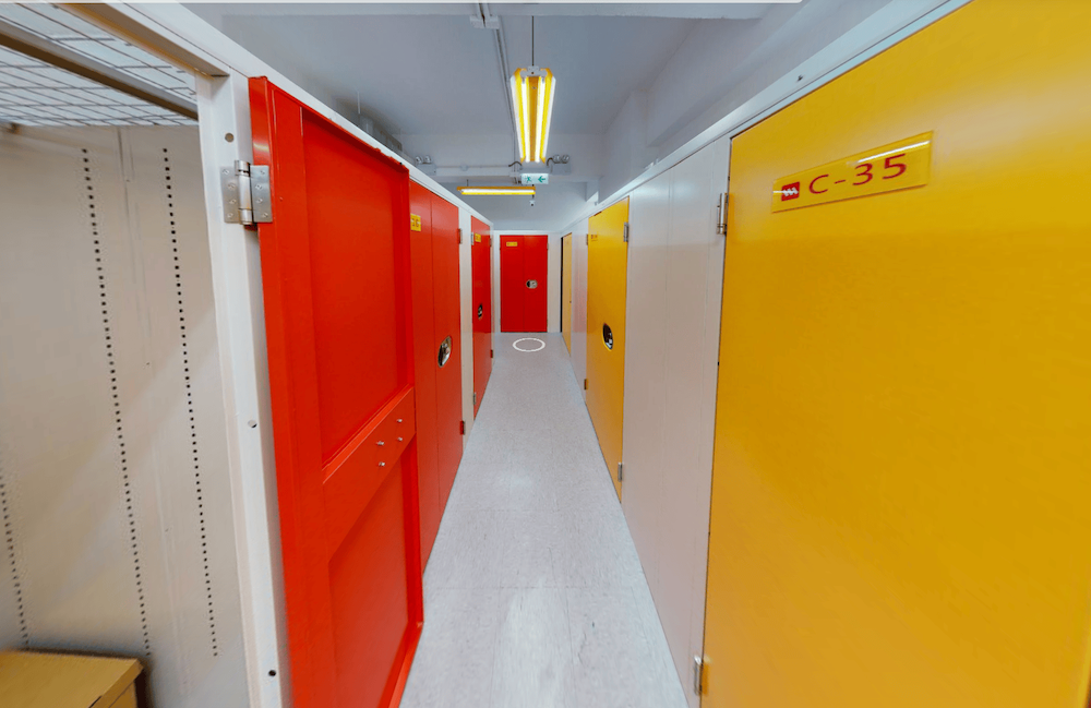Wilson Storage Mong Kok - Storage corridor with red and yellow unit doors
